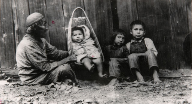 here's a 1920s photo of an unidentified Yurok baby in a cradle basket, from the autry museum's collection