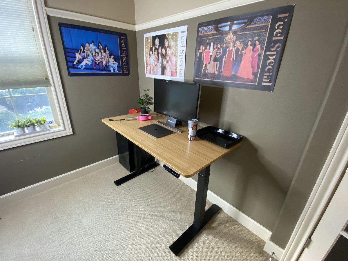 JackPhan's tweet photo. My wife gets to #WFH with me over the next 2 weeks. Finally setup the Smart Desk 2 standing desk in my office. Do you think she'll like the decor? 😊🍭 #worksmarter 

#iamAutonomous #beAutonomous 
Want your own? 👉🏽 https://t.co/3WEY3JTBje https://t.co/1Ar3PBZRJx