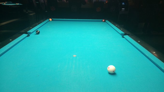Corona with extra lime to fight the corona virus and look at this tie game! Enjoying a night of pool