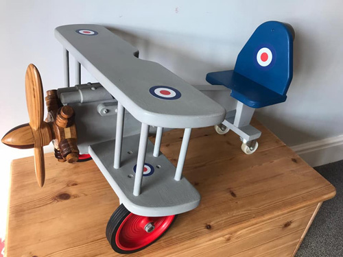 🎶Come fly with me, let's fly, let's fly away🎶
Vintage hand crafted, solid wood, Ride On Bi Plane. 
Landing soon at the Toybox in Happy Days Vintage Homestore, Cowbridge.
To book your seat visit: bit.ly/3d07u0y