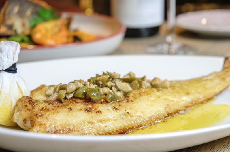 When you see this much butter on a dish, you just KNOW it’s going to taste incredible! This is our whole baked lemon sole with melted parsley butter, your choice of capers, toasted almonds or both, served with fries. 😍 Plus, we have a live jazz band at the weekends from 2-5pm.