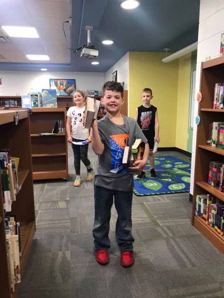 WHAT ARE YOU READING? Our students literally checked out thousands of books to take home while schools are closed. We can't wait to hear all about the adventures they will take. #readingrocks