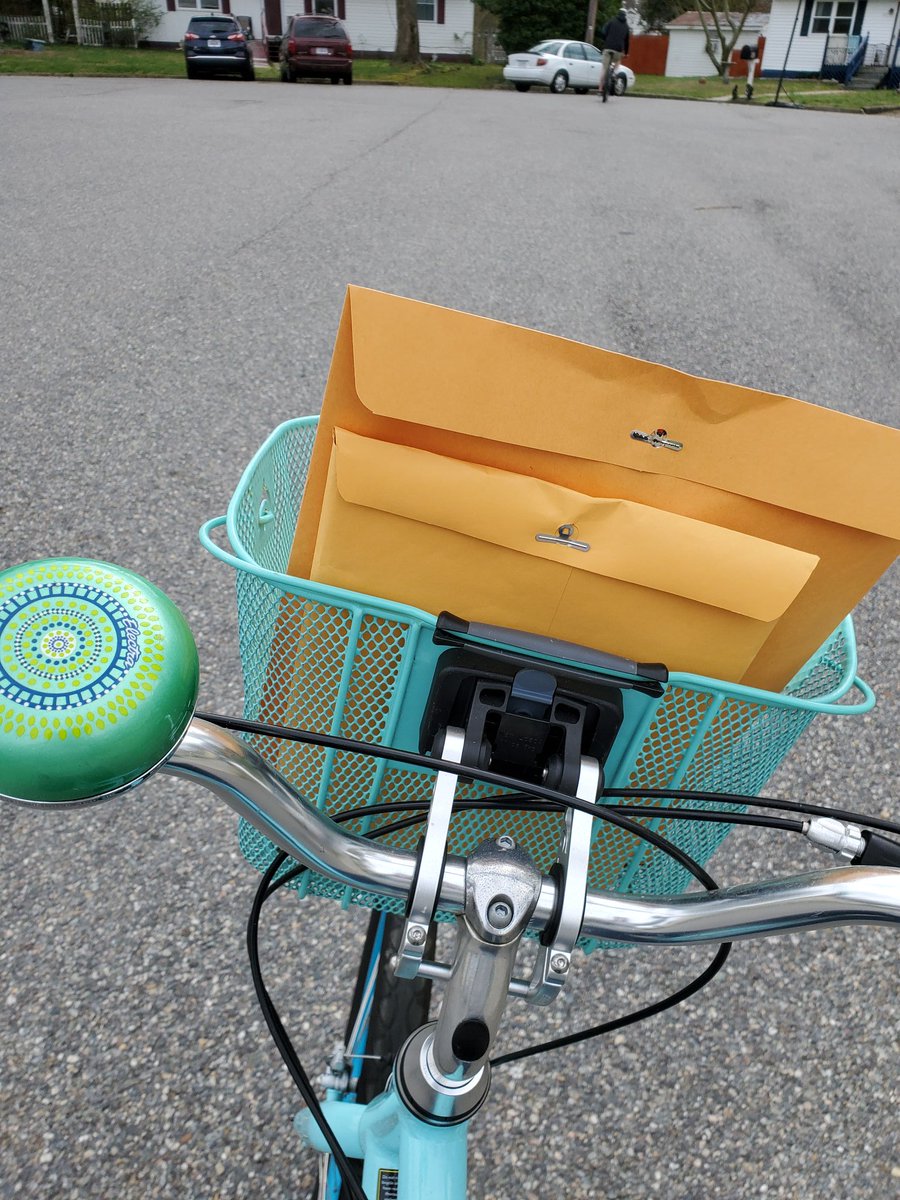 Ronzgal97's tweet photo. Fearless leaders and teachers ready with schoolwork packets for pickup - even delivered a few by bike. #yorkcountystrong #pantherpride @goqlms #engagedycsd https://t.co/AMAESgliSO