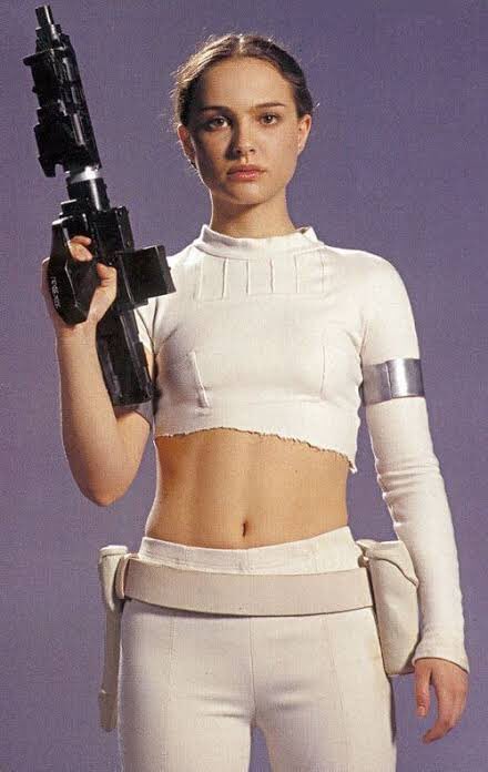 7 | PADME AMIDALA from “STAR WARS” natalie portman with a big gun. her in fancy pretty dresses and cool make-up. her talking about democracy and being a powerful QUEEN AND SENATOR. i don’t think i need to say anything else.