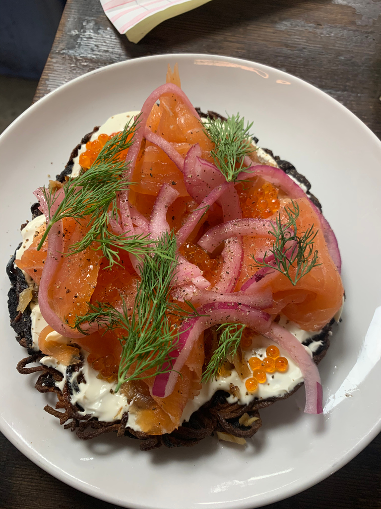 Mmmm. . . Latke schmeared with creme fraiche, sprinkled with smoked black cod, lox, trout roe, pickled red onion &amp; dill. ⁠Available for brunch at our Domino location, every day until 3pm!