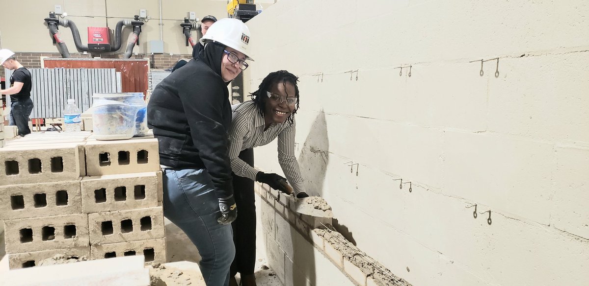 tomward68's tweet photo. Eastpointe Mayor Monique Owens stopped by for a tour and couldn't resist laying a few bricks with pre-job student Kayla #apprenticehips #opportunity for all. https://t.co/WDe3llSJH2
