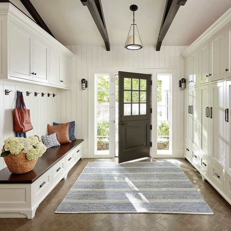 Check out this gorgeous mudroom designed by @catherinegoodsellinteriors
featuring our Empire Cabinet pulls, bin pulls, mushroom cabinet knobs &amp; whale tail hooks. #luxuryinteriordesign #mudroomgoals #bronzehardware #luxuryhardware  #handcastbronze #interiordesign