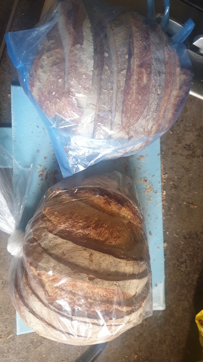 Davetarpey's tweet photo. Just sliced up 2 loaves of sourdough bread. I am now prepped for quarantine/closure of artisanal bakeries! #COVID19 #middleclassconcerns https://t.co/T36Z5xNVQs