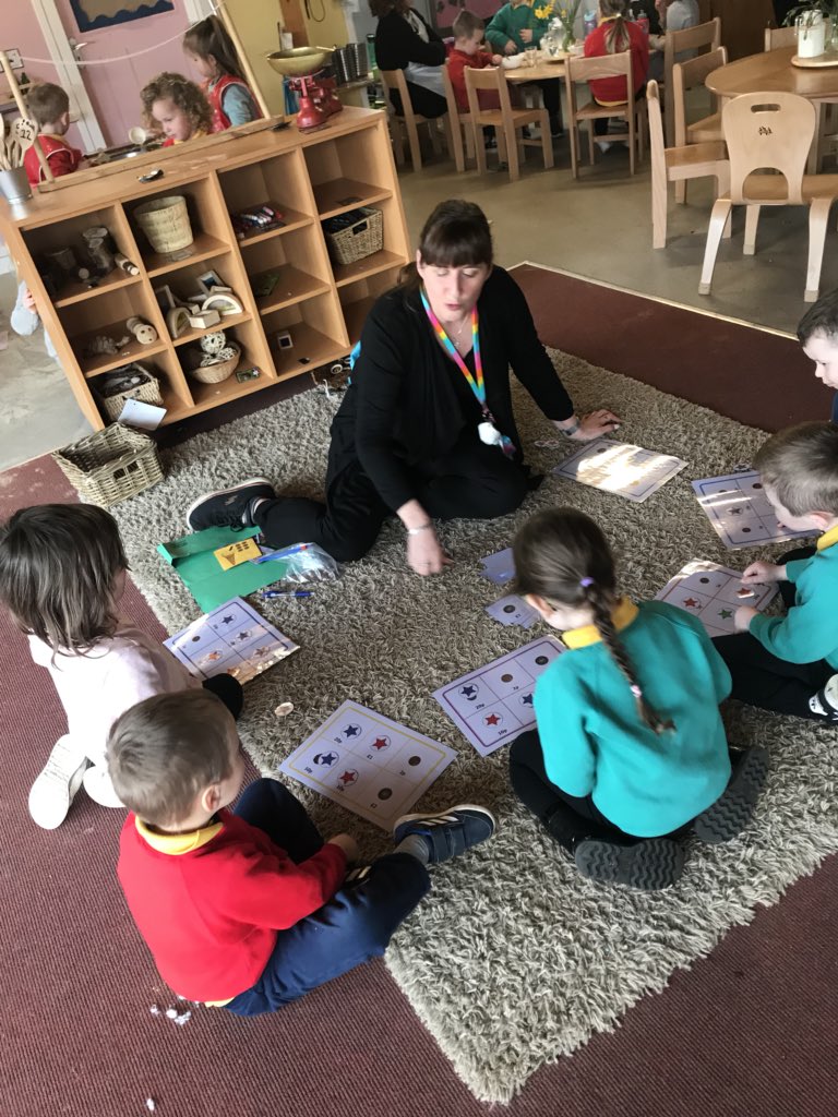 StSerfsPS's tweet photo. Nursery had a buzz of learning today with lots of small focus group learning taking place, Mrs S & learners continued to develop their coinage awareness by playing bingo! Learners then took turns to be the bingo caller before shouting BINGO! #earlynumera #focussedlearning https://t.co/lDR2aniX1J