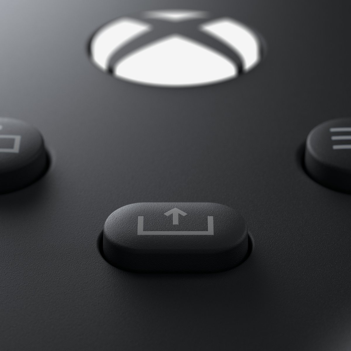 Close up of the Xbox controller’s share button.