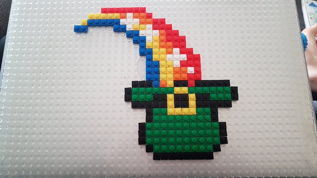 ElliotLibrary's tweet image. A St Patrick&apos;s design inspired by @BrikBuild design gallery to decorate my Brik Book.  Need to buy more 1x1 Briks so I don&apos;t run out like I did on this build.