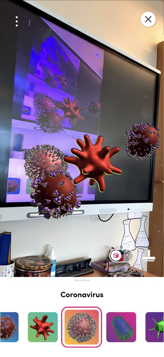 MissTaylor_2's tweet photo. Pupils looking at the different types of viruses and making comparisons🦠 Merge cube helped us visualise them. https://t.co/akttbjemMa