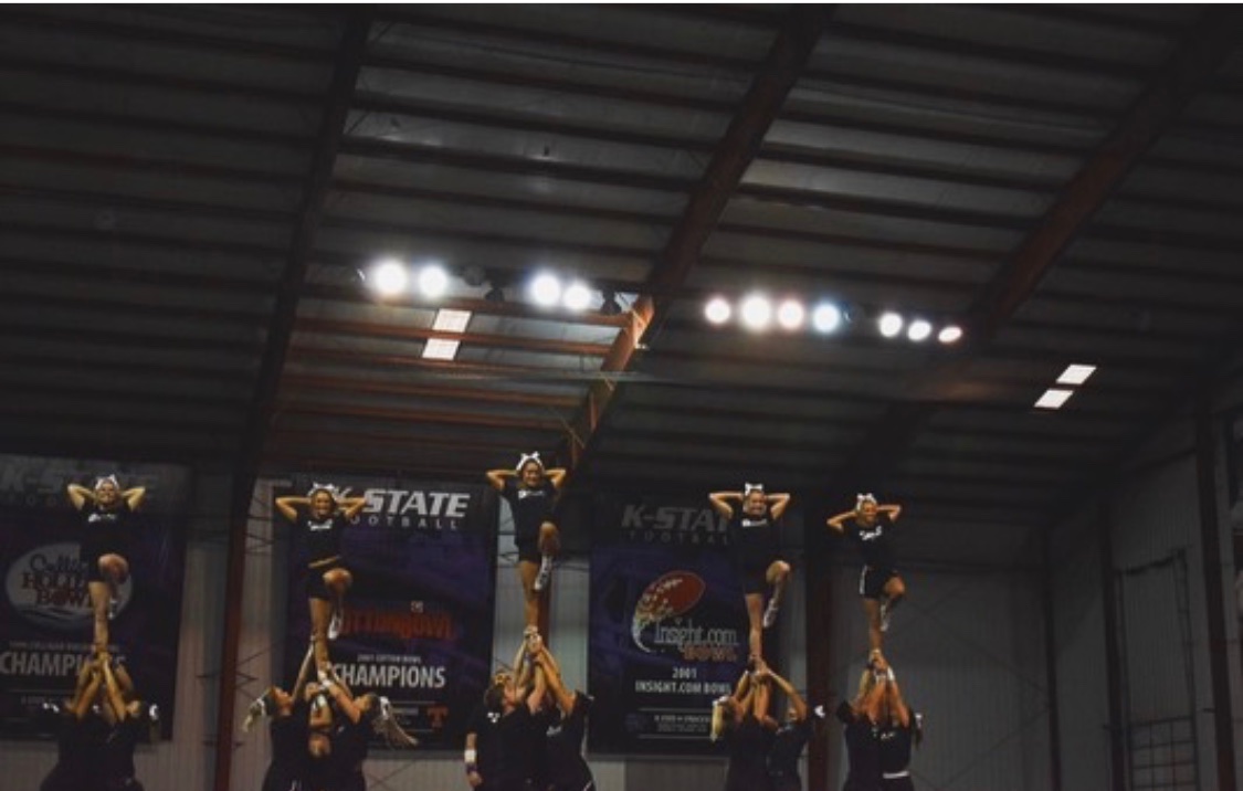 Sam_Chlebicki's tweet photo. @notthefakeSVP #seniornight the @KStateCheer team has multiple talented seniors and captains, who are now ending their cheerleading careers without a final competition. They deserve a shoutout💜 #emaw https://t.co/rtAbFpPA0d