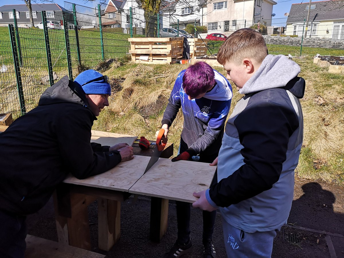 EFLC_EVE's tweet photo. Leo works hard cutting wood to rebuild our garden steps!  Great work today Leo and Jaylin! 👏👏 https://t.co/oxsZWPjejI