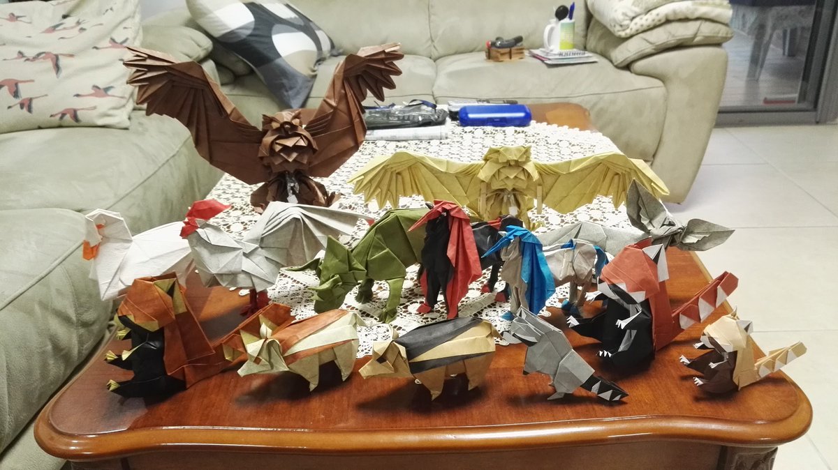 Origami animals(and unicorns),all designed by <a href="/Kyohei_Katsuta/">勝田恭平／Katsuta Kyohei</a>  (besides the Triceratopes). All folded by me-Eyal R, from various papers and from this excellent book:
origamihouse.jp/book/original/…