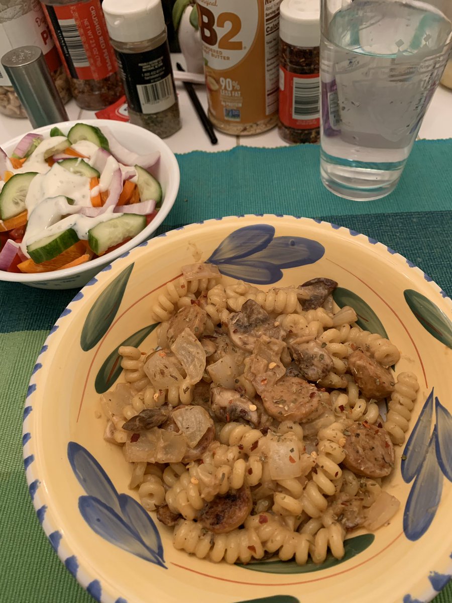 Fusilli bucati Alfredo w/ hot Italian chicken sausage and mushrooms, plus a garden salad.