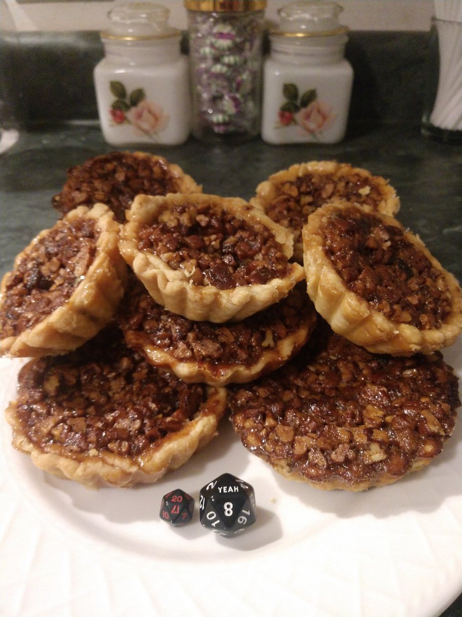 ezbakeslayer's tweet photo. Pecan pie tartlets. (Different sized d20s for different sized tartlets.) #Criticalrole #TheSlayersCake #critters #dungeonsandbaking https://t.co/R92SpjiR1n