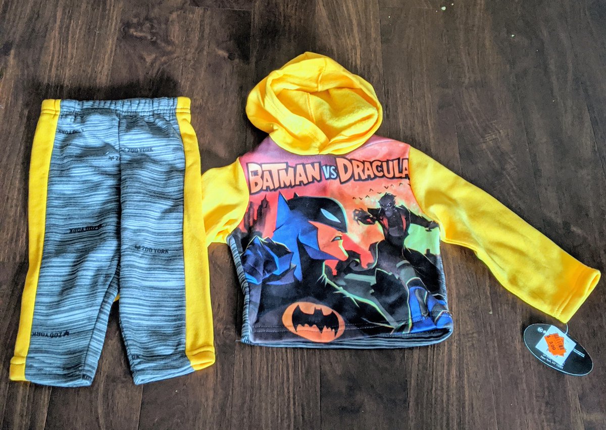 This Batman vs Dracula outfit costs $3 for the set. Look closely at the grey fabric.