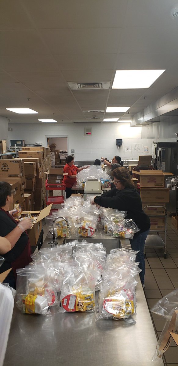 ClintonHS's tweet photo. Operation Food Distribution in full swing this morning. Thank you to everyone for all their help!  #ClintonFamily #MaroonPride https://t.co/76bU64LMcI