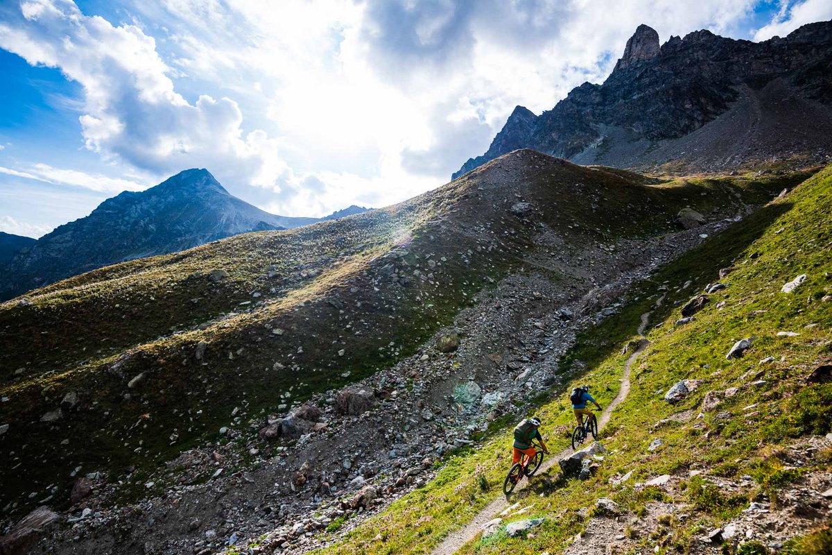 bikemag's tweet photo. Holger Meyer and Massimo Ferro hunting for altitude near Col Vessona in the Aosta Valley, Italy. | Photo: Mattias Fredriksson #bikemagpod https://t.co/ypJya6QLi2