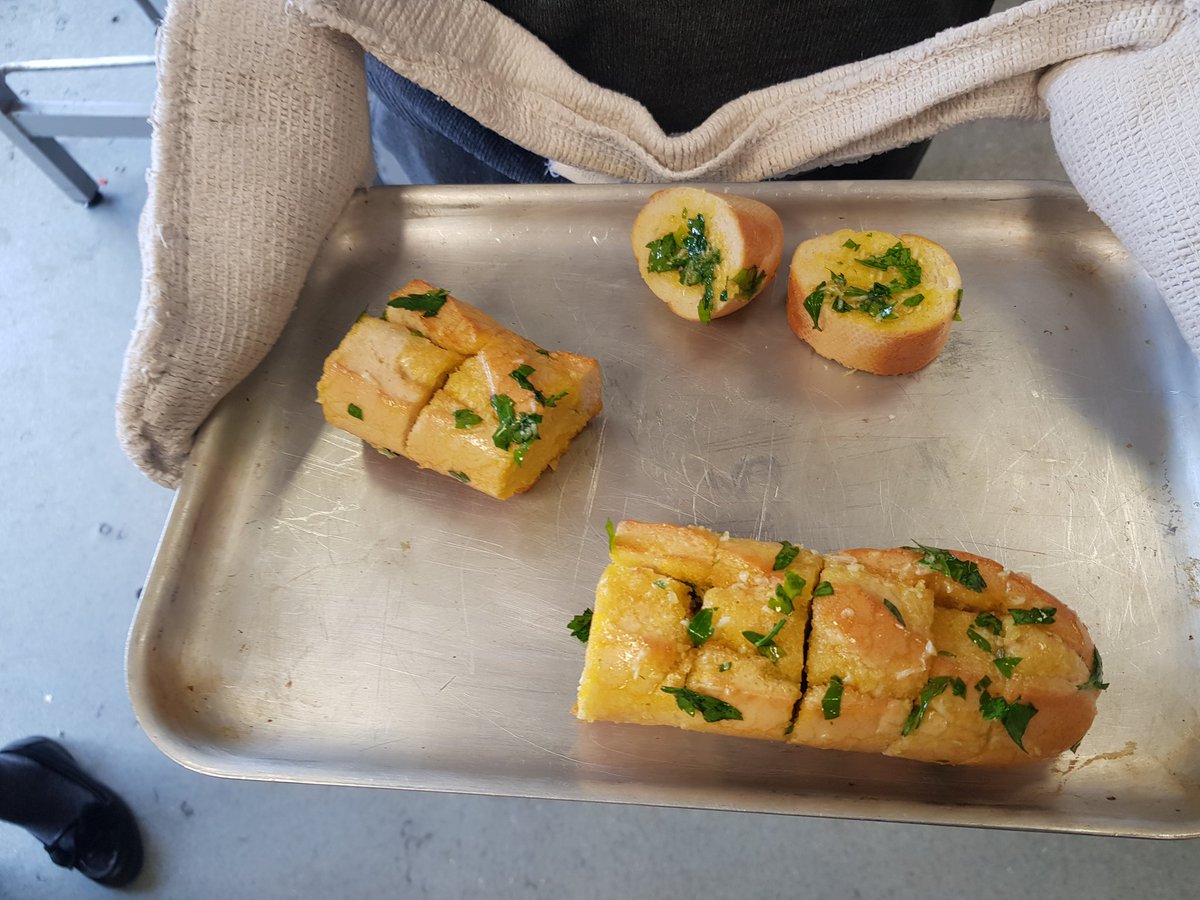 VCP2019's tweet photo. @OrchardParkHigh learners meeting the #cooking challenge head on. Pizza, curry, garlic bread and egg fried rice :) @VCP2019 https://t.co/gwKxM0FDyI