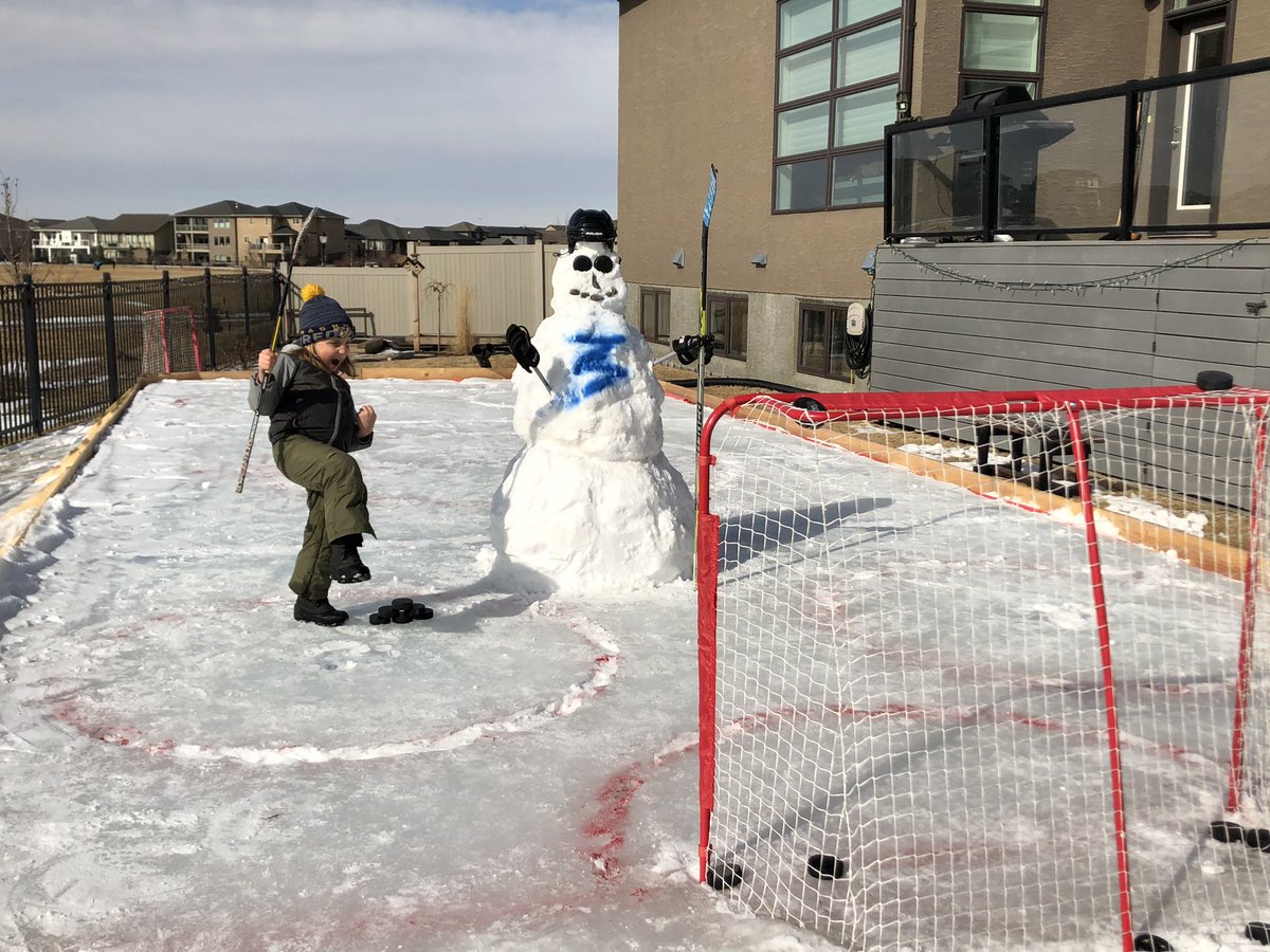 ailsby's tweet photo. 14 day quarantine, kid hockey cancelled, rink melting, no kids 2 play with...none of that stopped this 7 year old from meeting a new friend &amp; having him over to play hockey. Elias tells me his new friend’s name is “Stam” who is a great shot &amp; a big @TBLightning fan #suckitcovid19 https://t.co/D3D91R54aZ