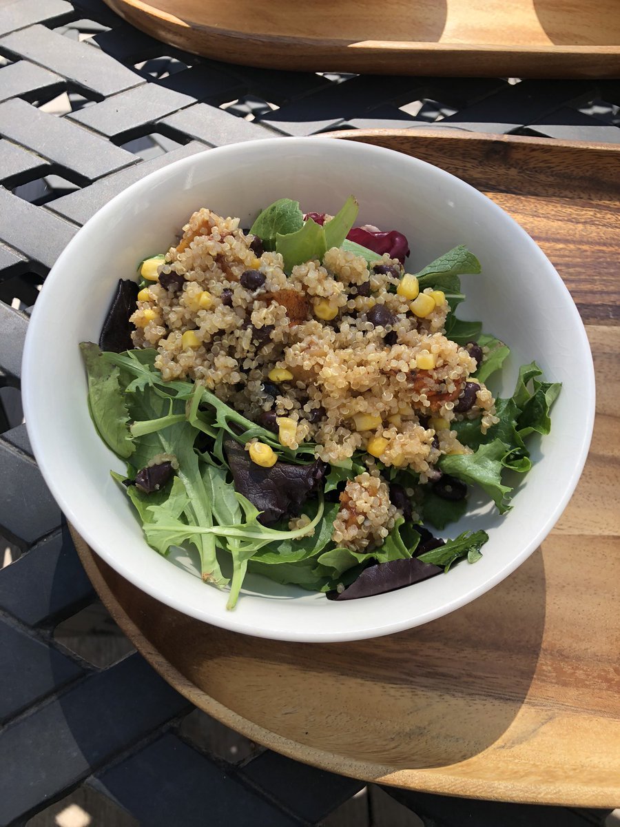 Sarah went healthy for lunch quinoa with black beans corn and butternut squash over a mixed green salad.