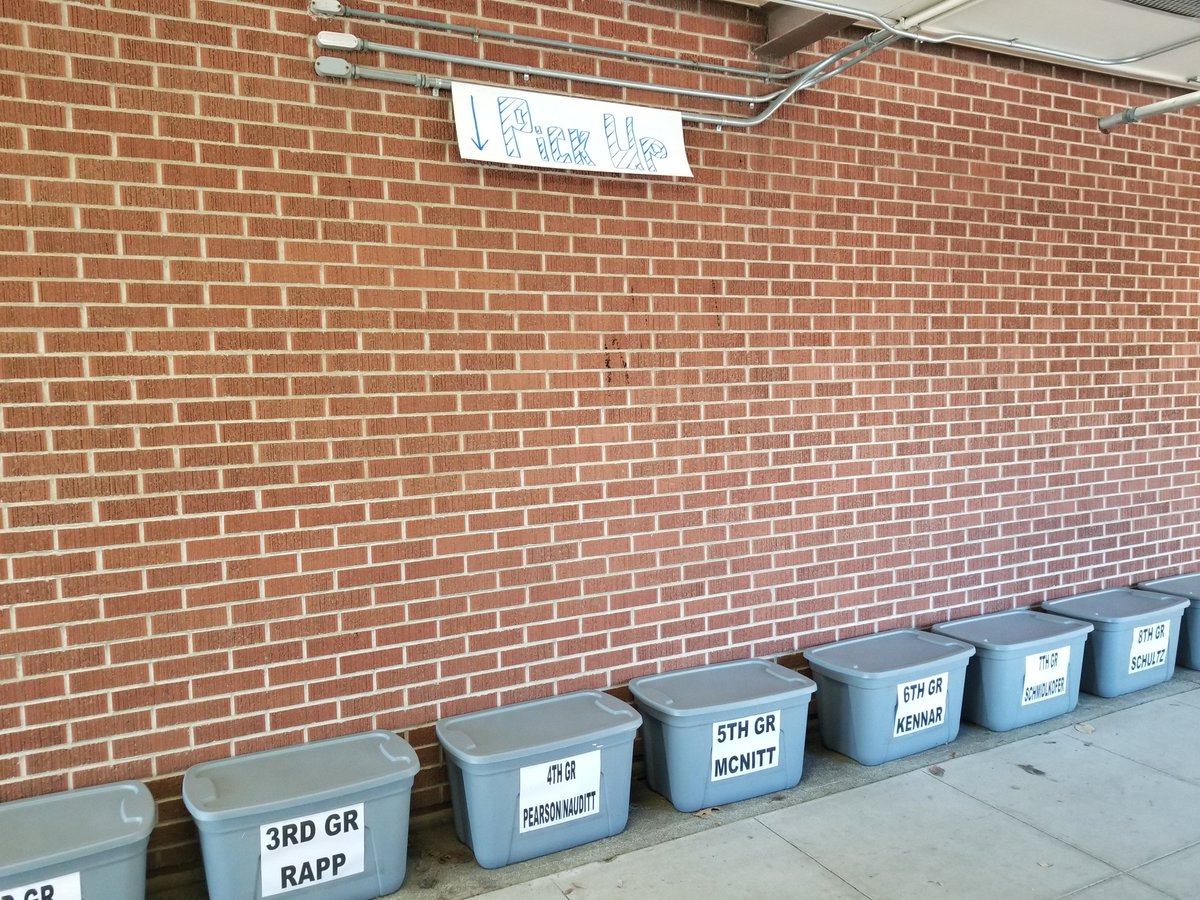 Our kids will be learning and we're almost ready to go! Drop off and pick up homework boxes line the breezeway. Example of homework packets ready to go!