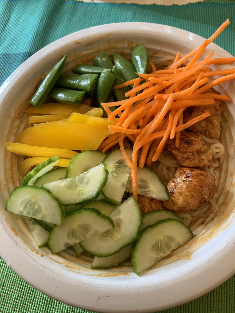 Chilled shiritaki noodles tossed in a spicy peanut sauce topped with soy-sesame-marinated chicken and vegetables.