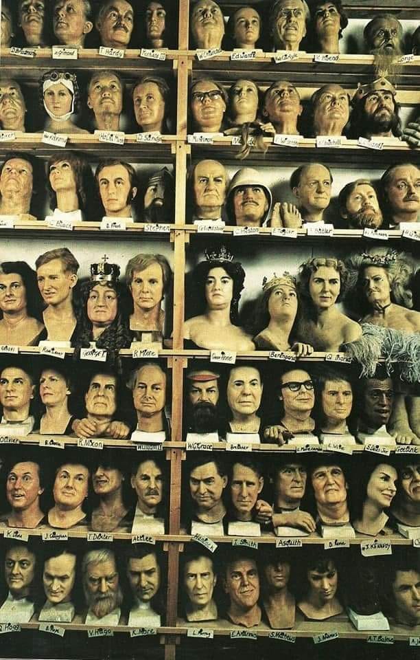 The retired heads of Madam Tussauds. Oddly poignant.
2nd row from bottom, 5th along - Tony Hancock. 
In a prophetic Hancock ep., 'The Waxwork,' Sid James says 'Fame? It's fleeting, mate. As soon as you go out of fashion they'll melt you down & make a couple of jockeys.'