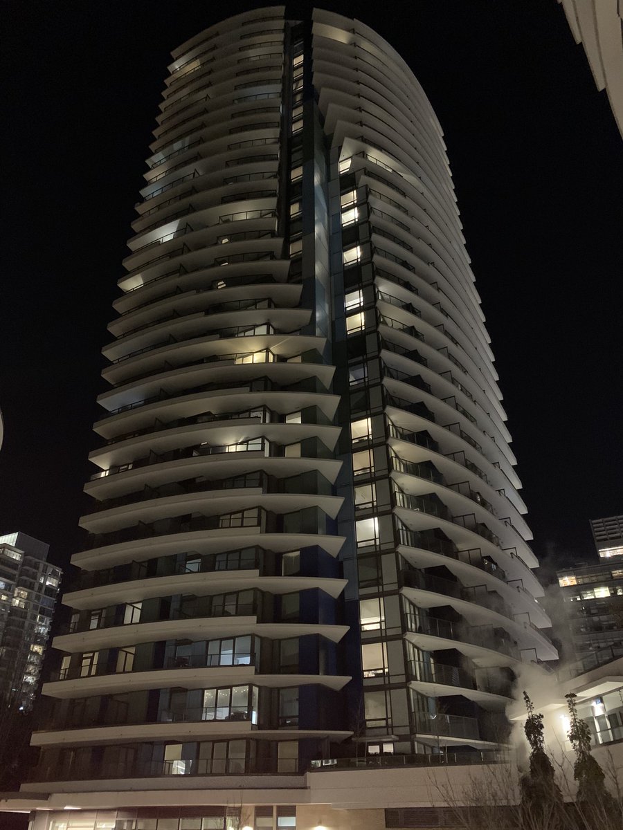 Various towers at Marine Gateway today around 8:30 pm. Surprised to see so few lights on considering this was largely marketed as reasonably affordable, transit-oriented housing for locals. #vanre  #HomesForWhom