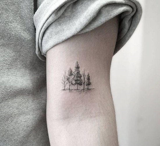 Minimalist tree tattoo on the tricep