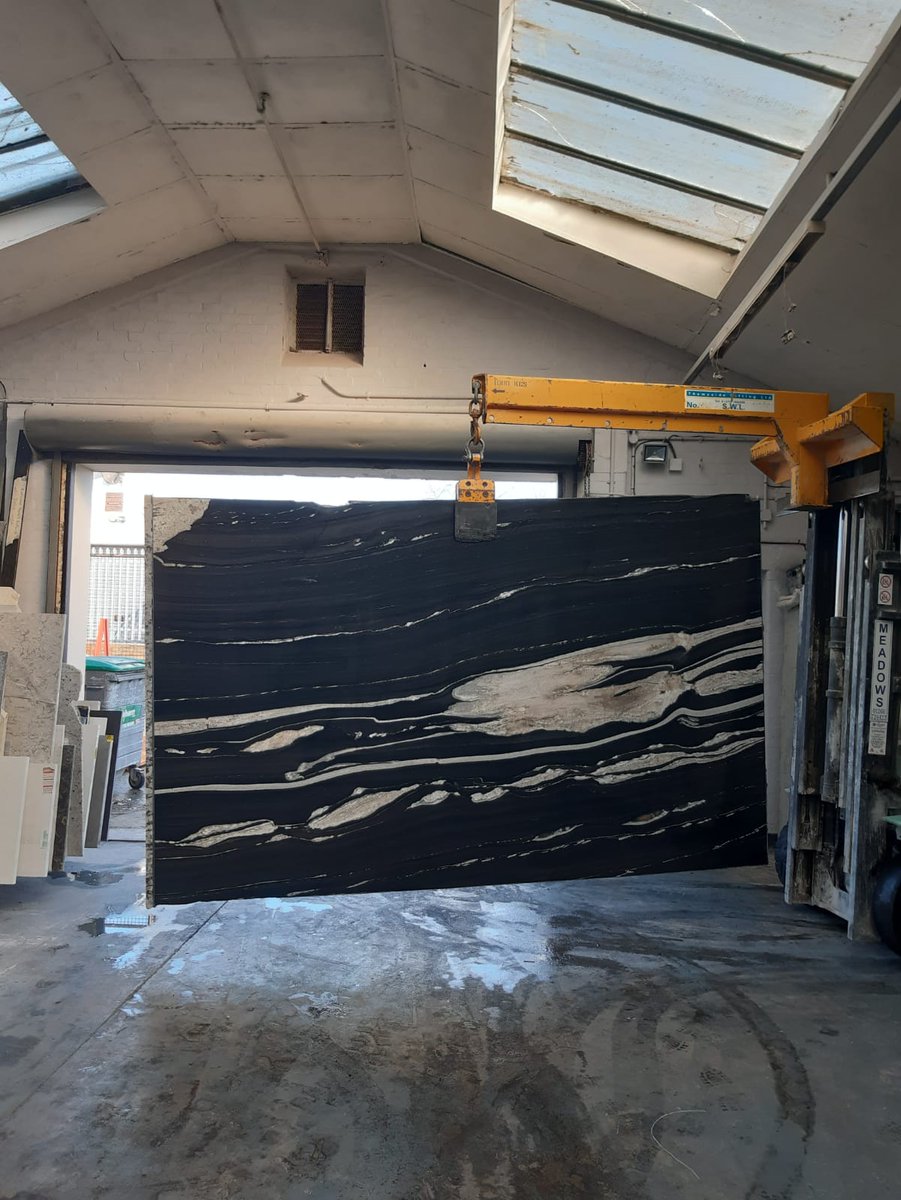 🎵Music & passion were always the fashion at the copa... they fell in love🎵 
We recently received this absolutely beautiful #stoneslab of Copacabana #granite from @PisaniWholesale & we haven't been able to get the song out of our heads since! #UseNaturalStone #Essex