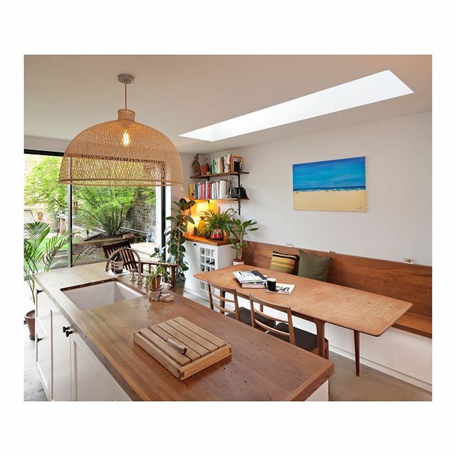 Kitchen and dining area at Béton Brit. The worktop and bench are made from reclaimed teak flooring (originally from Plaistow Hospital) and are by @lasscoropewalk. Pendant light by @wonenmetlef. Photography by @davidbarbour. . . . #architecture #design #i… ift.tt/394BF3r