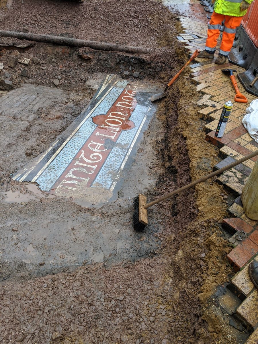 coventrycc's tweet photo. We've uncovered this mosaic tile in Upper Precinct which is thought to be from The White Lion, which was demolished in the 1950s to make way for the escalator. We're currently working to see if we can remove it in one piece - making the best of the old and the best of the new! https://t.co/23YSBsLPN8