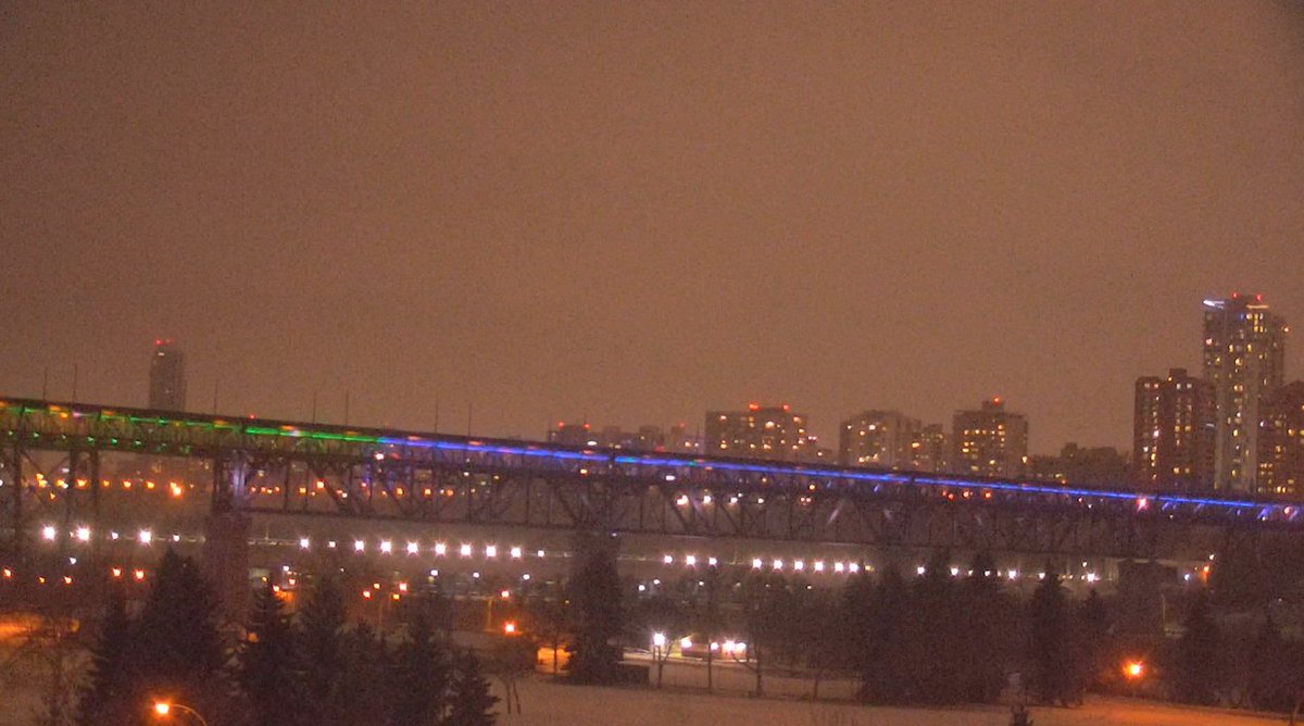 CityofEdmonton's tweet photo. March 23-27: The lights on the High Level Bridge, City Hall, Muttart Conservatory &amp; Rossdale Power Plant will be lit in blue &amp; green to honour &amp; thank #HealthcareWorkers everywhere who are working tirelessly in the battle against the #COVID19 pandemic. #LightTheBridge https://t.co/9fHz13DP53