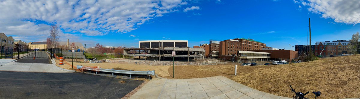 TimSloanDC's tweet photo. I'm standing on the newly finished one block extension of Burke Street SE where demolition continues on "wings" of DC General hospital. Burke St will go extend 3 blocks total, connecting to a new street grid. #reservation13 #DCGeneral #bikeDC #HailNo @charlesallen @ggwash https://t.co/FvL6d8QQqx