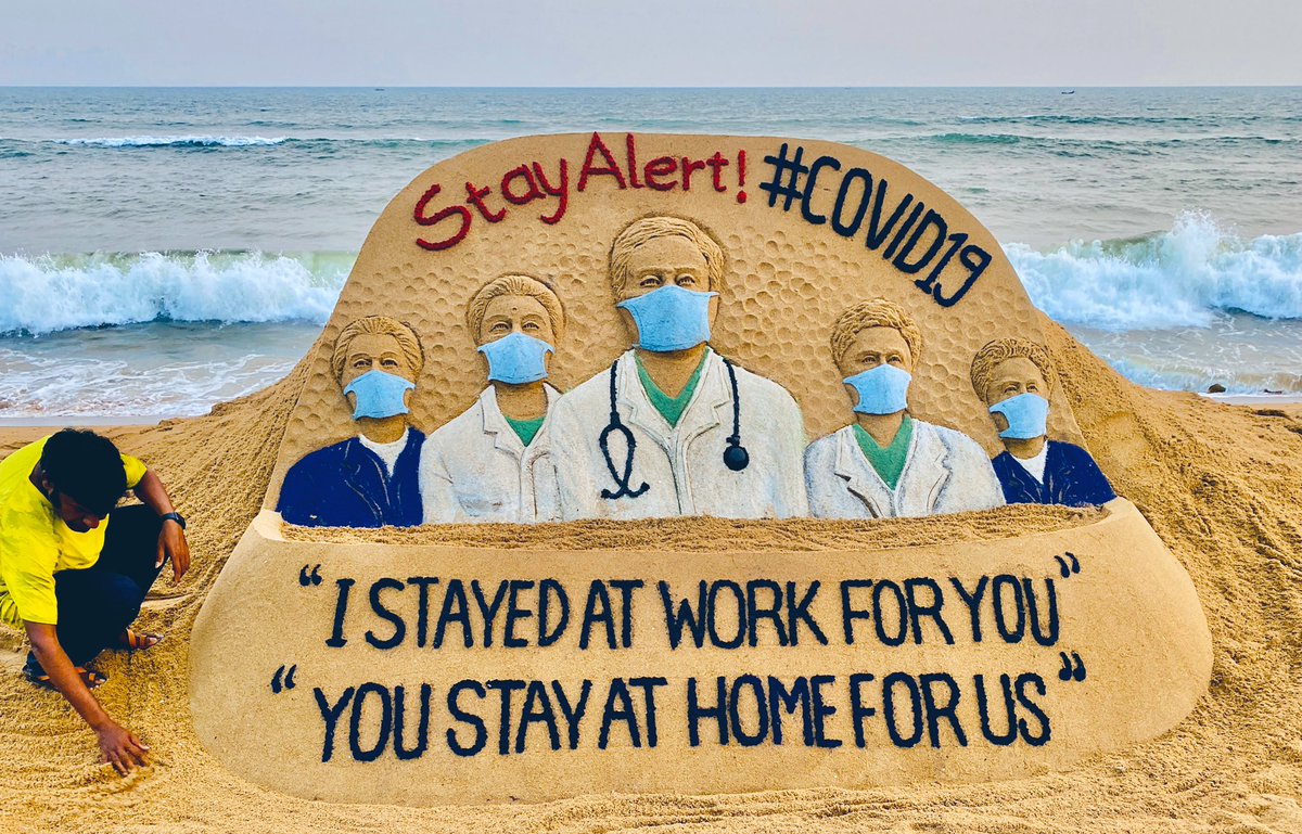 sudarsansand's tweet photo. Let’s salute all the medical teams around the world, who stand on the front line of #COVID19 fighting .My sand art at Puri beach, India which shows the medical teams appeal citizen with the message "I stayed at work for you", "You stay at home for Us". #SatyAtHomeSatySafe https://t.co/mhOfP9RgWi