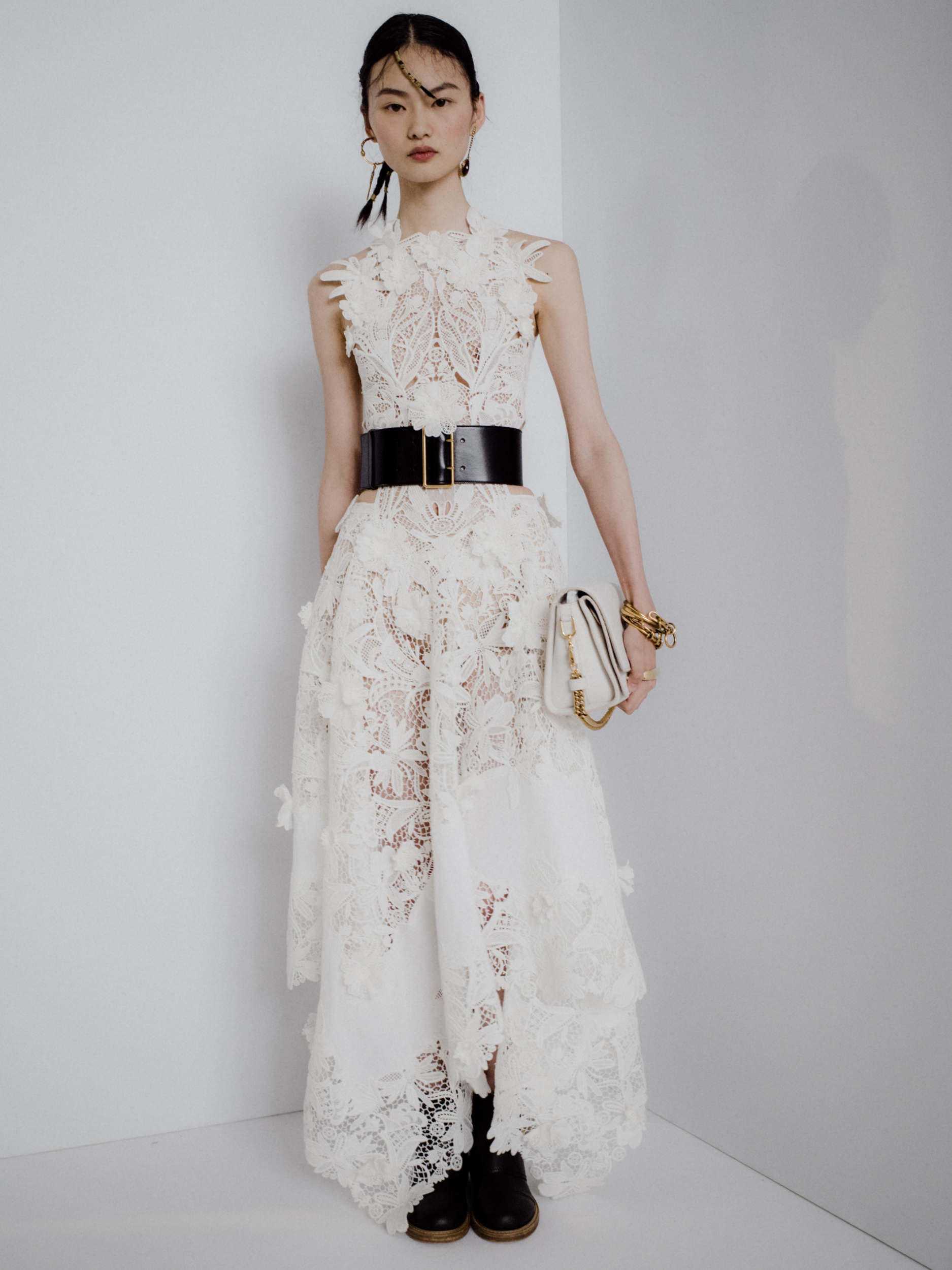 Alexander McQueen on X An engineered draped dress in ivory guipure lace embroidered with endangered flowers and inspired by Irish crochet. Discover the Spring Summer 2020 collection here https t 5Q...