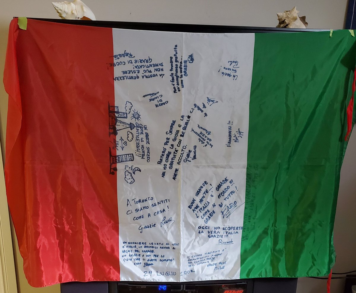 World Youth Day 2002. We meet  4 young people from Italy at Costco. Invited them for dinner that night. 15 people came over. They signed this flag for us. Wonderful Night. Let's continue to pray for them and everyone else in Italy.