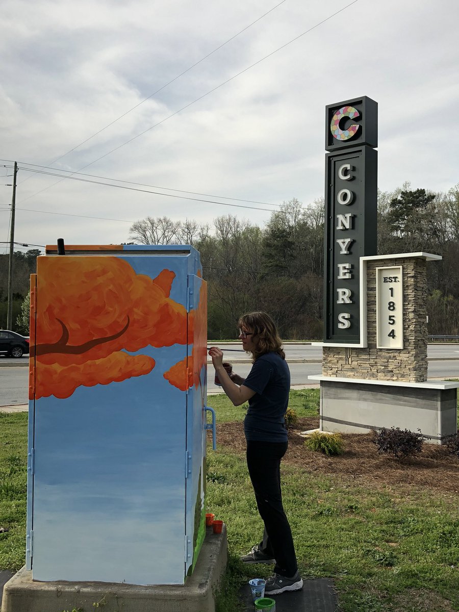CityofConyersGA's tweet photo. Check out artist Gabby Howard of @TheSketchingPad painting a traffic signal box as part of the @CRCArts Beautiful Box Project! Thanks @HighPriorPlumb for sponsoring this box at Flat Shoals Road/Parker Road. Art = joy! #art #beautifulbox #conyers #conyersga #weloveconyers 🎨 https://t.co/Tg7IsNRj65