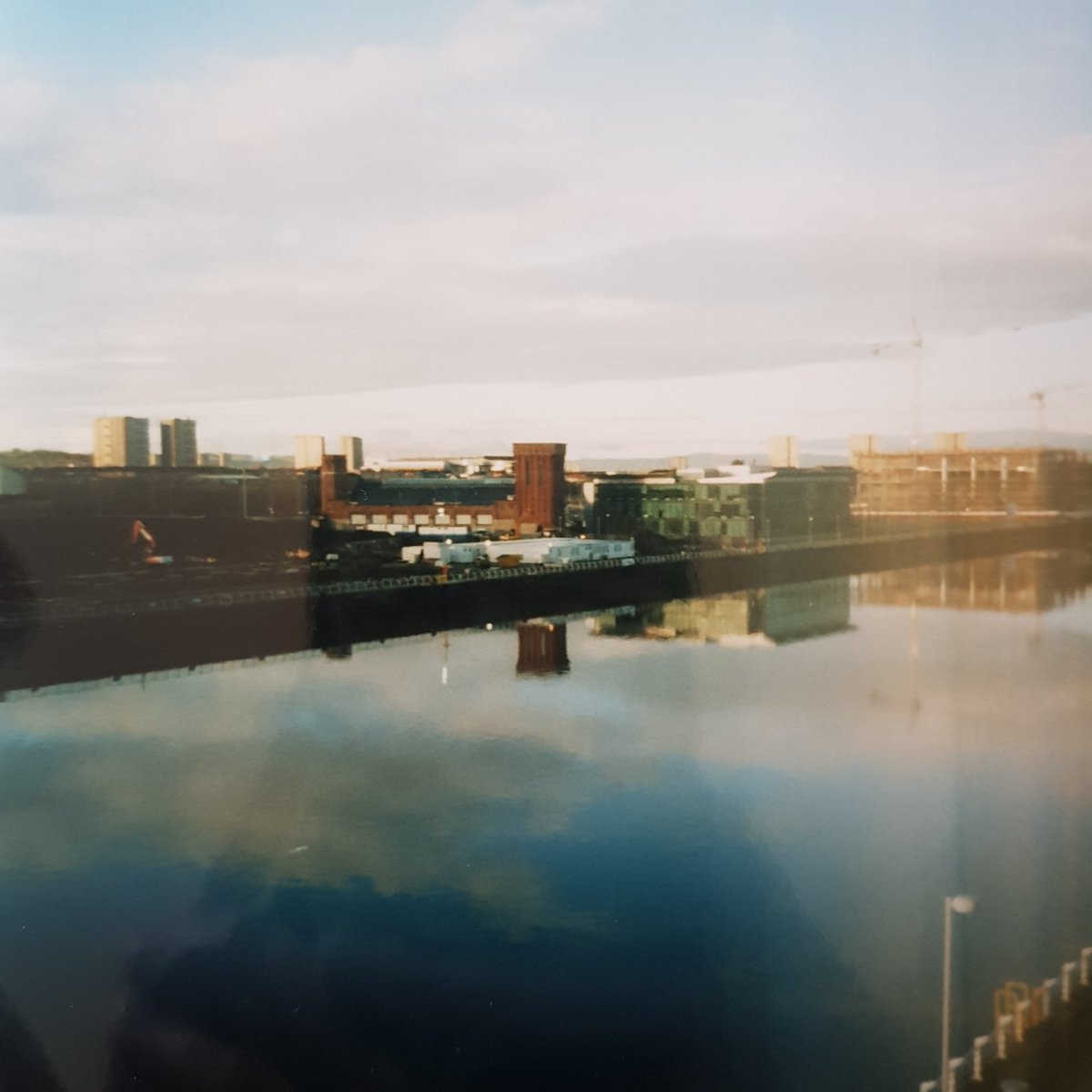 18.3.2020: three okay things• my boyfriend driving through to surprise me with records (my heart) • Mil being a little sushi roll this morning • finding this photo of Glasgow Harbour in my parents' collection of old 35mm snaps  #threeokthings  #seekingsunshine