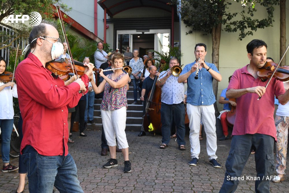 AFP's tweet photo. The Day the Music Died.

Orchestra members perform in Sydney, urging Opera Australia to reconsider its decision to stand down musicians without pay, and for Canberra to provide emergency financial support to the performing arts sector hit by the #COVID19 pandemic

📸 Saeed Khan https://t.co/pCjIjUjDPV