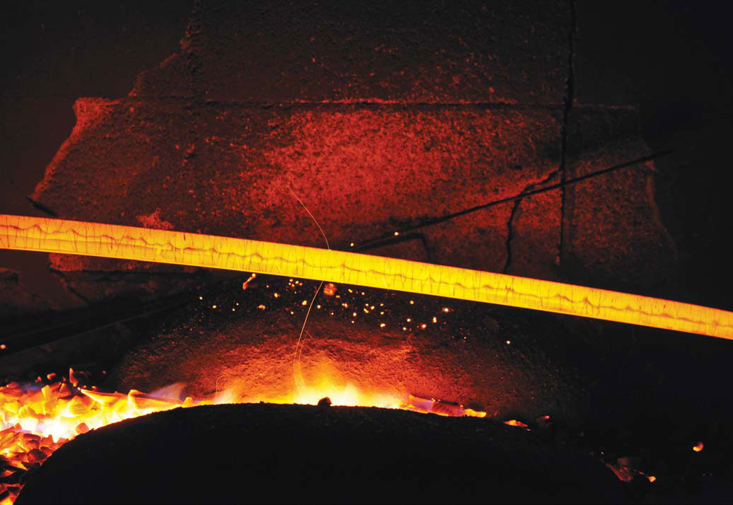 When a blacksmith forges a sword, he heats the iron until glowing red, then plunges it into sand to cool. Before, the sword is hard and brittle from being hammered; after, the sword is once again ductile, workable. This is called annealing, and we see its form in many places.