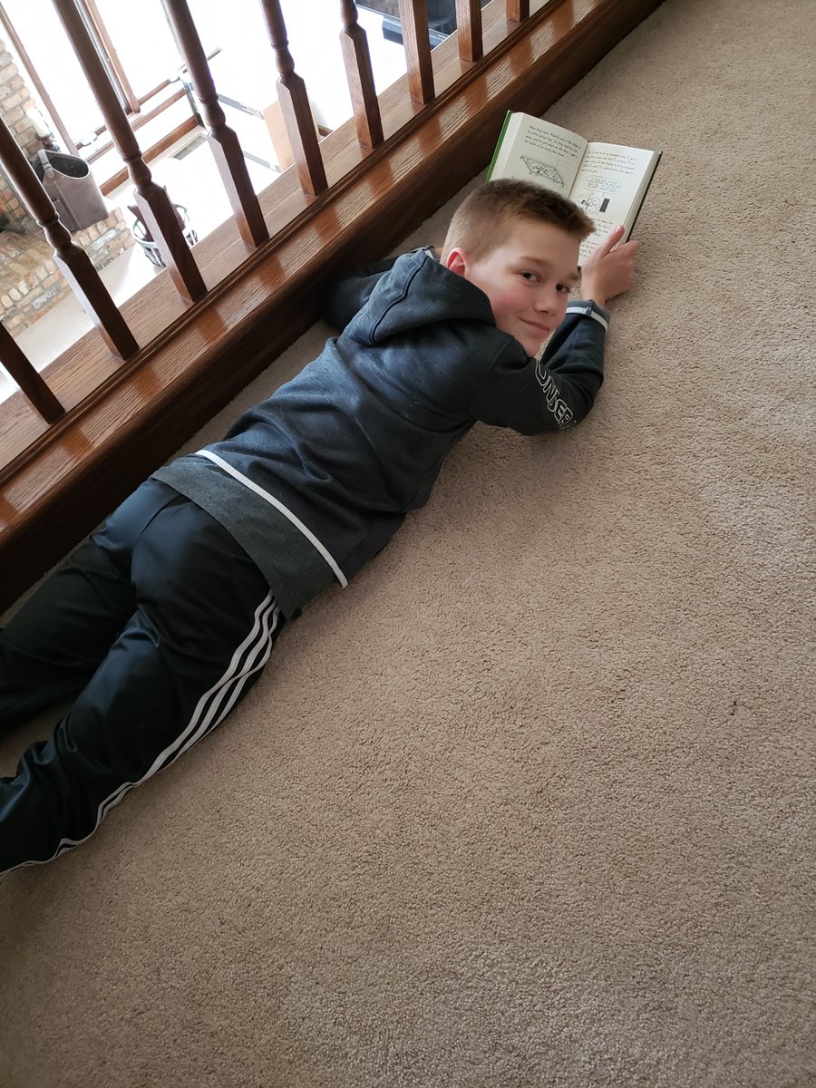 StraubMrs's tweet photo. Rainy day reading. #ASD4RemoteLearning https://t.co/tfOflFP9bo