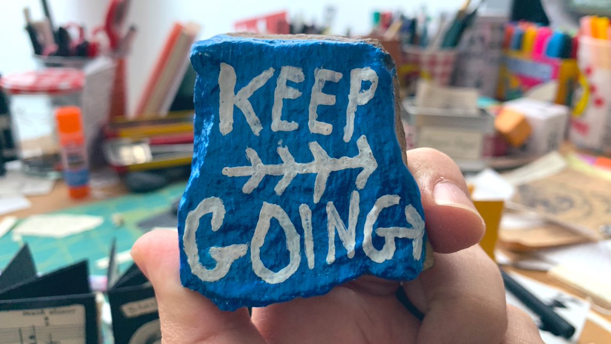 austinkleon's tweet photo. A young lady painted this rock and gave it to me on the #keepgoingtour. I keep it on my desk and look at it every day. https://t.co/hjGfAy12Db