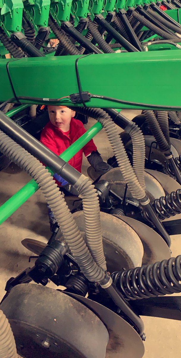 GSpoultry1's tweet photo. Finally found someone that can work comfortably under the middle of a Deere drill. #Milwaukee grease gun is a bit of a haul for him yet though. #farmkid #shopguy @OntAg @GrainFarmers https://t.co/PcyQeu5Vwy