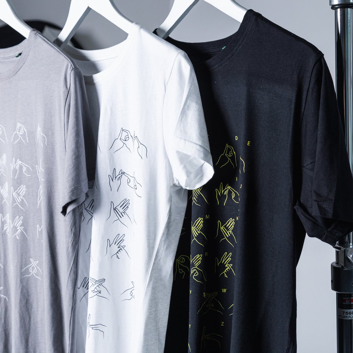 deafidentity's tweet photo. White on grey 🤍 Black on white 🖤 Yellow on black 💛 Which is your favourite colour combination of our Alphabet t-shirts? 🤍🖤💛 Order yours at https://t.co/q3jggZslfv #deafawareness #bsl #signlanguage #auslan #australiansignlanguage #britishsignlanguage #deaf #signlanguageweek https://t.co/3NolcAEp8l