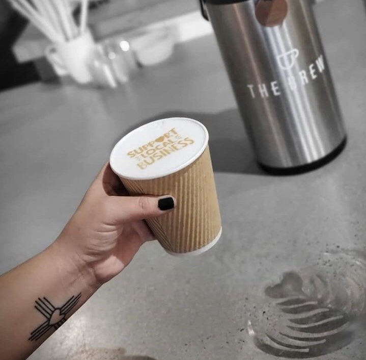 ABQartwalk's tweet photo. The Brew is offering #GET2GO coffee and curbside pick up daily 8am-12pm! Order inside or call them at 505-363-9453 to #GET2GO! https://t.co/r1g9c1dQfL