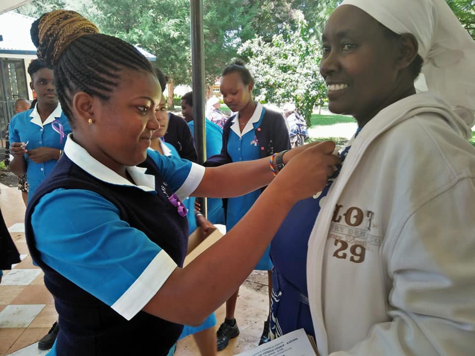 Sister Brenda Lung'atso and her students from St. Clare's Kaplong attended an International Women's Day march in Kenya, where they handed out white and purple ribbons to women to symbolize the intrinsic value that each of them holds.